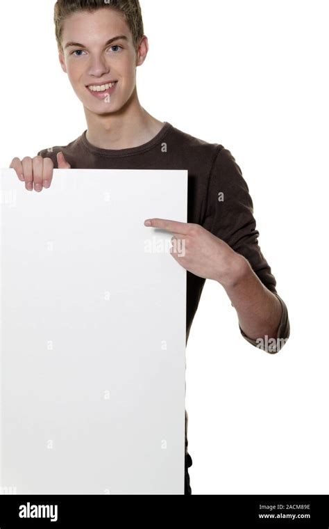 Young man with empty poster Stock Photo - Alamy