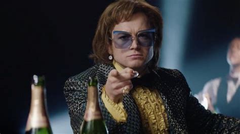 Blue sunglasses worn by Elton John (Taron Egerton) in Rocketman | Spotern