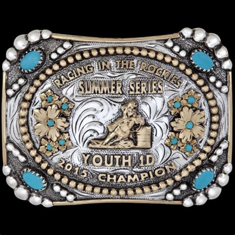 Las Cruces- This striking buckle is silver plated with a beaded and bron