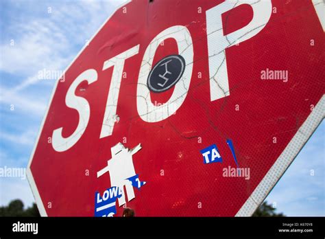 Stop sign with graffiti on it Stock Photo - Alamy