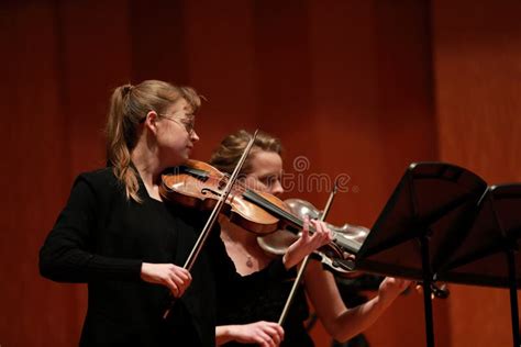 Classical Music. Violinists in Concert. Stringed, Violinist.Closeup of Musician Playing the ...