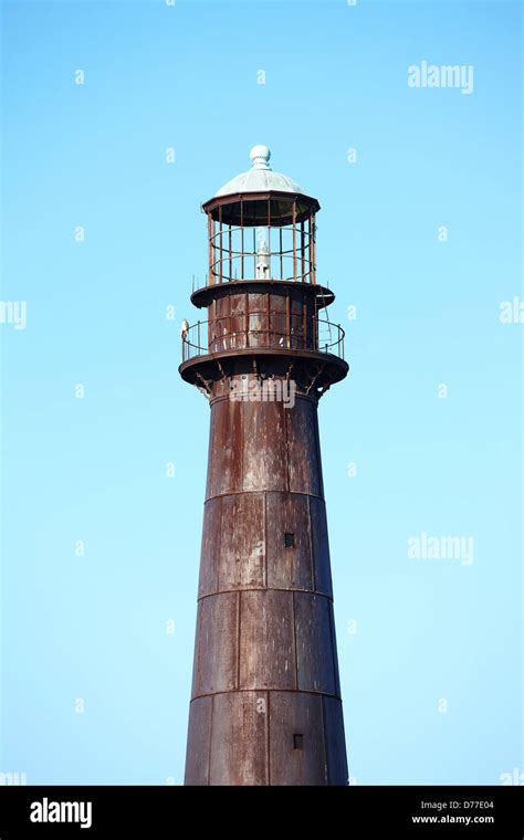 Low angle view lighthouse Point Bolivar Lighthouse Port Bolivar Bolivar ...