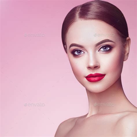 Beautiful woman face with perfect makeup Stock Photo by heckmannoleg