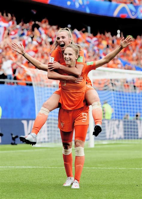 Vivianne Miedema #9 (front) of the Netherlands celebrates her second ...