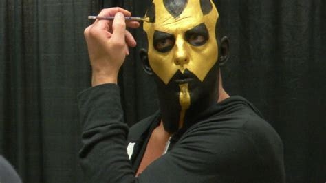 Goldust prepares his face for combat | WWE.com