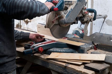 Premium Photo | Sawing wood pieces circular saw