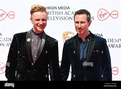 May 8th, 2022, London, UK. Owain Wyn Evans and husband Arran Rees attending the Virgin Media ...