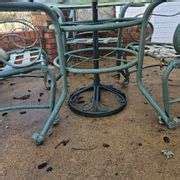 Metal and Glass Patio Table w/5 Heavy Metal Chairs, Umbrella, and Stand... - Walker Auctions LLC