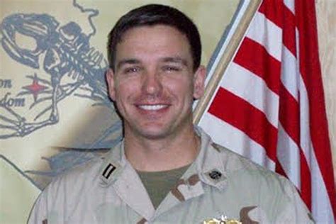 Ron DeSantis looks unrecognizable in Navy uniform photo as Florida governor pictured during Iraq ...