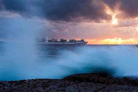 Jigsaw Puzzle of Container Ship sailing in to the Sunrise