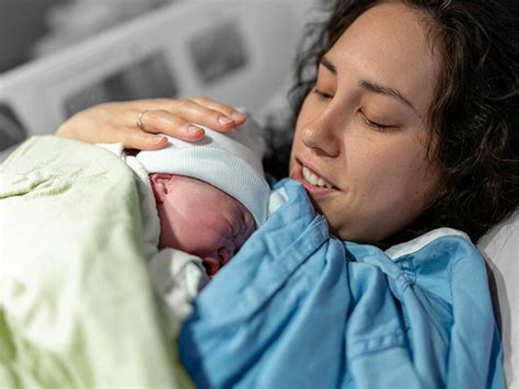 Pregnant Man Giving Birth To A Baby In Hospital