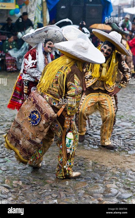 Guatemala, Chichicastenango, dancers at annual festival Stock Photo - Alamy