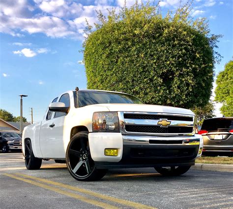 My lowered white 09 Chevy Silverado on Black Strada 24’s | Chevy trucks, 09 chevy silverado ...