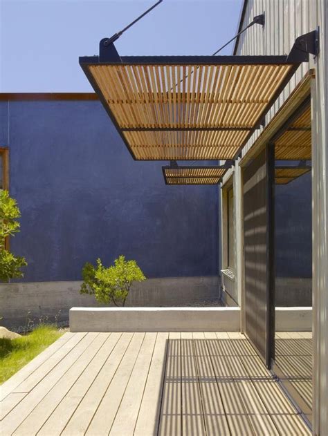 Exterior Sun Shade. Plaster wall.Santa Ynez House / Fernau + Hartman Architects | Pergola ...