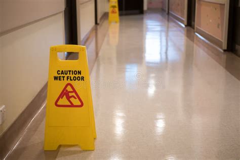 Sign Showing Warning of Caution Wet Floor in Hospital Corridor Stock Image - Image of alert ...