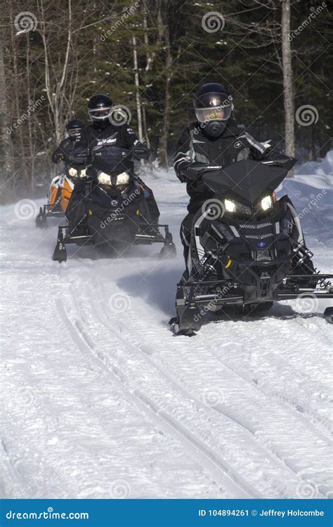 Snowmobilers Ride on a Trail on Bald Mountain, Rangeley, Maine ...