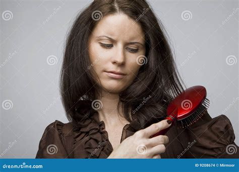 Combing hair. stock photo. Image of cosmetics, healthy - 9208674