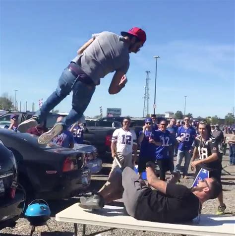 Buffalo Bills Fan Elbow Drops A Fellow Fan Through A Folding Table ...