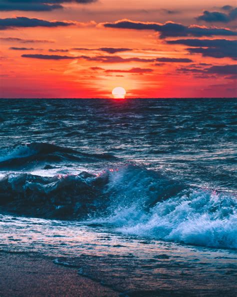 Photo of Ocean During Sunset · Free Stock Photo