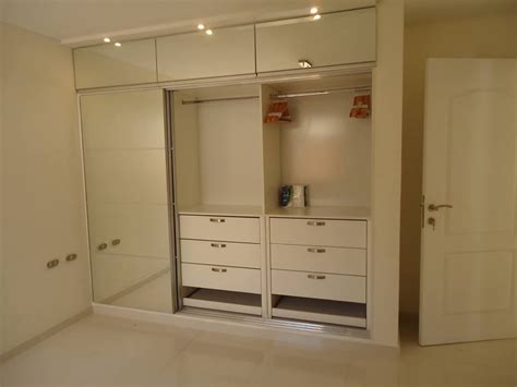 closet melamina y puertas con espejo....hecho a medida. | Diseño de armario para dormitorio ...