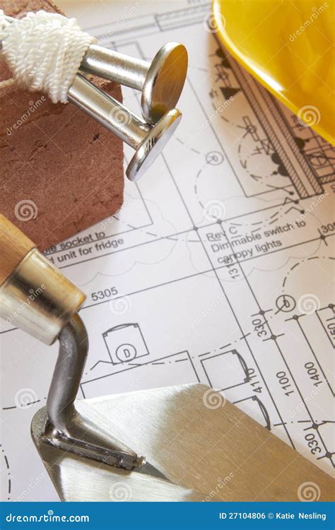 Builders Tools Arranged on House Plans Stock Photo - Image of tester, designer: 27104806