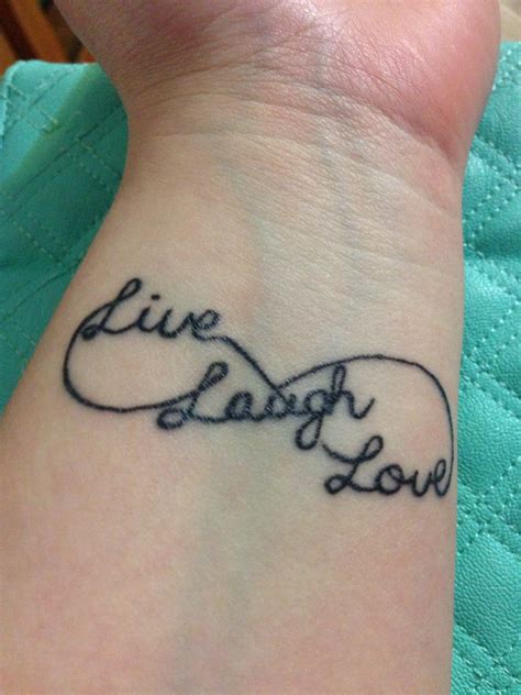 Live Laugh Love Tattoo | Love wrist tattoo, Wrist tattoos, Love tattoo ...