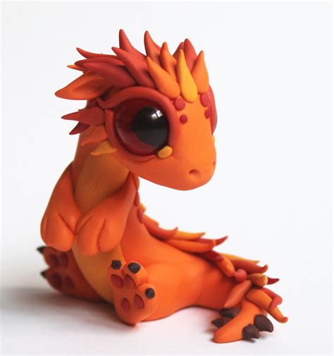 Baby Fire Dragon by BittyBiteyOnes on deviantART | Polymer clay dragon, Polymer clay animals ...