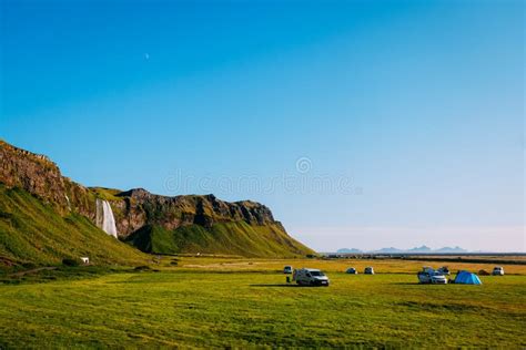 Camping and Tourists Near the Seljalandsfoss Waterfall in Iceland Stock Photo - Image of ...