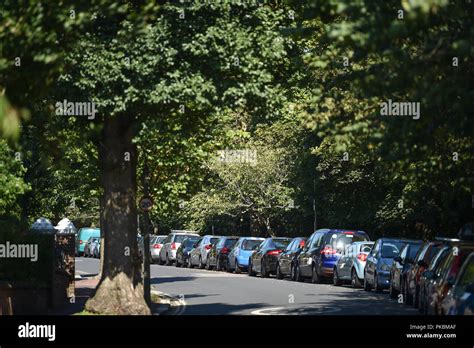On street paid for car parking by Queens Park in Brighton city centre Stock Photo - Alamy