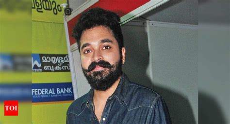 Actor Farhaan Faasil sports a stylish 'stache while attending a literary event in Kochi ...