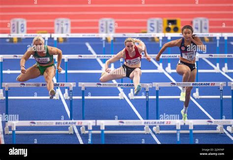 Sarah Lavin, Mathilde Heltbech and Lai Yiu Lui competing in the women’s 60m hurdles on Day Two ...