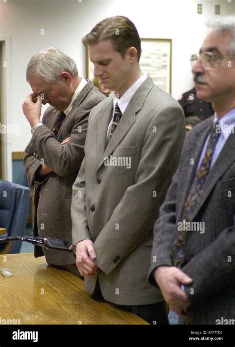 Christian Longo, center, bows his head as he is sentenced to death by ...