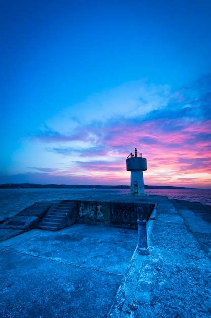 Premium Photo | Lighthouse at sunset