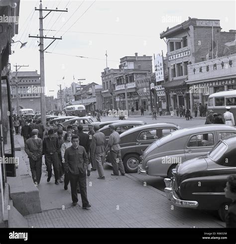 1950s, historical, a street in old Beijing, China, showing buildings ...