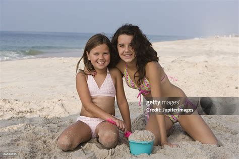 Portrait Of Girls On Beach High-Res Stock Photo - Getty Images