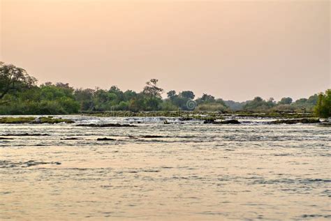 Sunset Over the Zambezi River Stock Photo - Image of victoria, season ...