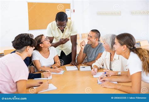 Diverse People on Language Courses in Classroom Stock Image - Image of ...