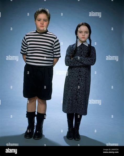 CHRISTINA RICCI and JIMMY WORKMAN in THE ADDAMS FAMILY (1991), directed by BARRY SONNENFELD ...