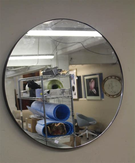 Lot - ROUND FRAMELESS WALL MIRROR