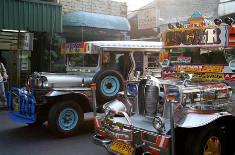 Philippine jeepneys. Photograph by Christopher Rowlands - Fine Art America