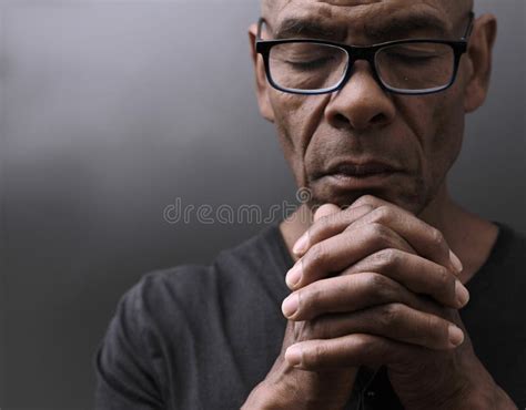 Black Man Praying To God Caribbean Man Praying with Black Background ...