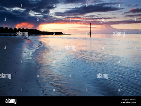 Low Tide Sunset, New Brighton Beach, Wirral Peninsula Stock Photo - Alamy