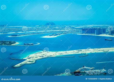 Aerial View of Palm Jumeirah Island with Luxury Yachts in the Front ...