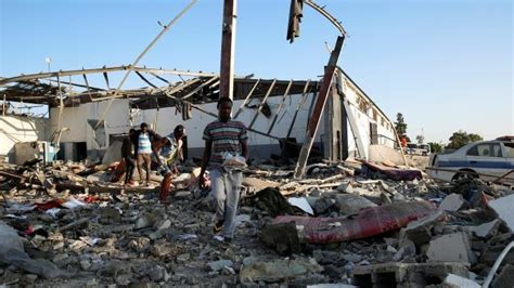 Violence Flares Up in Libya: Airstrike Kills 40 at Tripoli Migrant ...