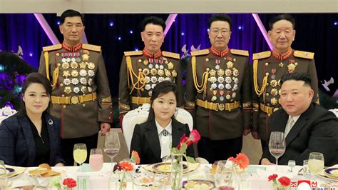 Kim Jong Un makes rare appearance with daughter at military banquet | World News | Sky News