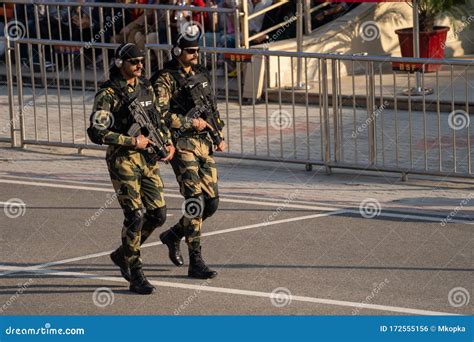 Indian Border Security Force Members March To the Border Against Pakistan Rangers at the Waga ...