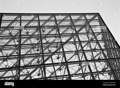 Simple design of Louvre Pyramid - Louvre Museum, Paris Stock Photo - Alamy