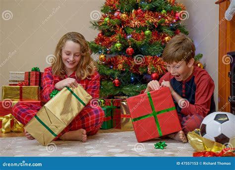 Children Opening Christmas Presents Stock Image - Image of brother ...