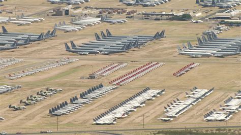 HD stock footage aerial video of groups of military airplanes in an aircraft boneyard, Davis ...