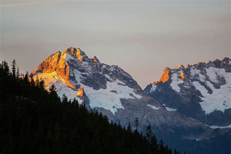 Sunrise Over Tantalus Range On Mountain Highway In British Columbia Photograph by Cavan Images ...